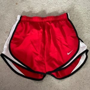 Red Nike running shorts size S